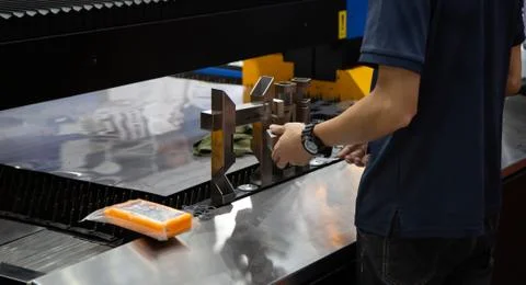 CNC laser cutting machine cutting tube Stock Photos