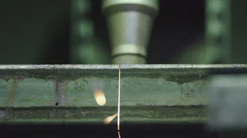 Cnc laser cutting machine slicing through metal Stock Footage 318190145