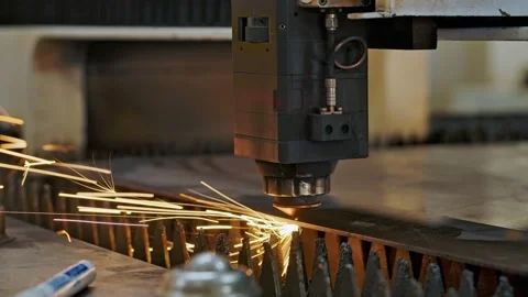 CNC Laser Cutting Machine With Sparks Processing Metal Sheet In Industrial Stock Footage 318430097