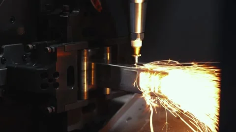 CNC Laser Cutting Machine With Sparks Processing Metal Sheet In Industrial Stock-Footage 325266155