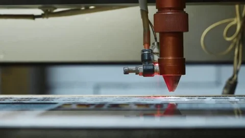 Cnc Laser cutting machine at work. Acrylic plastic cutting. Close-up Stock Footage 76963855