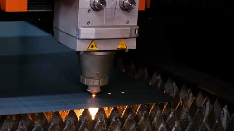 Cnc Laser Cutting Machine Working with Sheet Metal with Sparks 動画素材 199424381