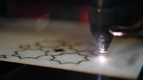 Cnc laser cutting of orient pattern decorative wood, modern industrial Stock Footage 59527259