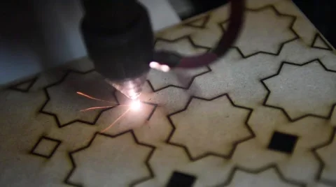 Cnc laser cutting of orient pattern decorative wood, modern industrial Stock Footage 59527387