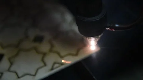 Cnc laser cutting of orient pattern decorative wood, modern industrial Stock Footage 59527393