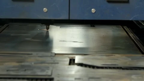 CNC laser machine for cutting metal plate on industrial manufacture. Stock Footage 246618254