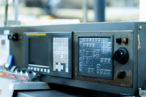 CNC Lathe Control Panel in an Industrial Manufacturing Facility Stock Photos