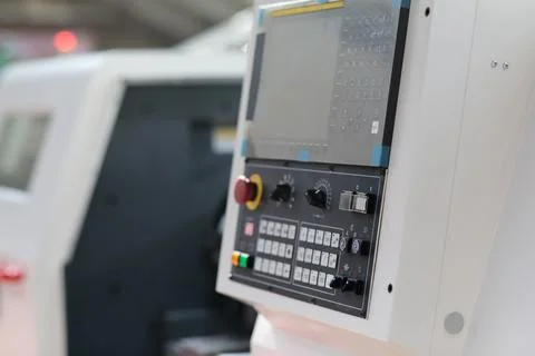 CNC lathe machine and control panel close up Stock Photos