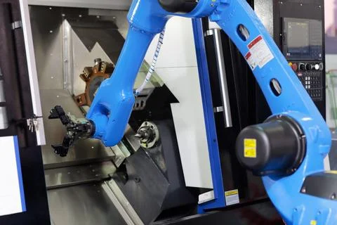 CNC lathe machine with collaborative robot Stock Photos