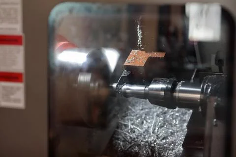 CNC lathe machine working with parting tool Foto stock