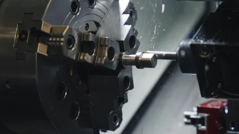 CNC Lathe Machining Process Inside Industrial Metalworking Machine Stock Footage 337190237