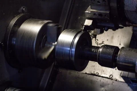 CNC lathe pulls out part of metal workpiece pulley, modern lathe for metal 写真素材