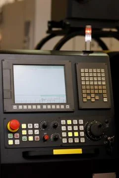CNC machine control panel with alarm signal Stock Photos