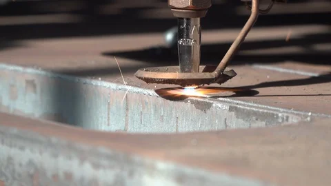 cnc machine cuts a metal sheet using gas | Stock Video | Pond5