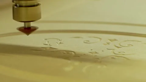 Cnc machine cuts a pattern on a wooden canvas close-up Stock Footage 201285688