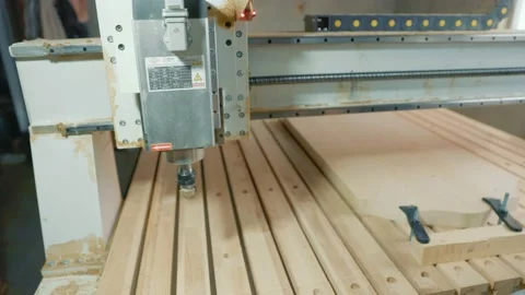 CNC machine cuts a pattern on a workpiece Stock Footage 169043059