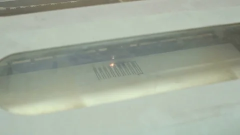 CNC machine cutting wood with a laser. CNC machine at work. Close-up. Stock Footage 82500687