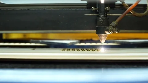 CNC machine cutting wood with a laser. CNC machine at work. Close-up. Stock Footage 82502802