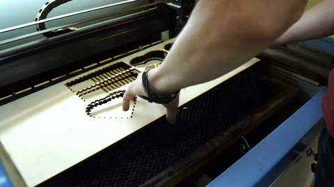 CNC machine cutting wood with a laser. CNC machine at work. Stock Footage 82524991