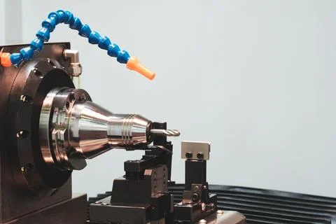 A cnc machine with a drill bit in it. Industrial background concept Foto stock