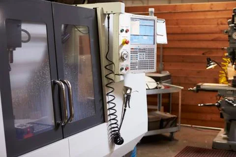 CNC Machine In Engineering Factory Stock Photos