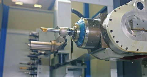 CNC machine in industrial workshop, automated process of changing nozzle Stock Footage 229430134
