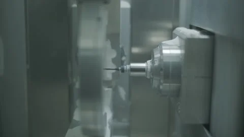 CNC Machine Milling a Dental Crown Blank Stock Footage 305992540