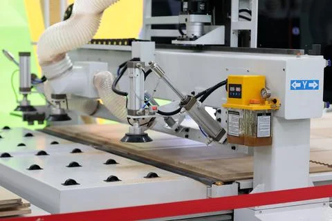CNC machine milling MDF kitchen cabinets doors Stock Photos