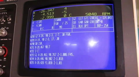 CNC machine monitor display with program code running Stock Footage 63216147