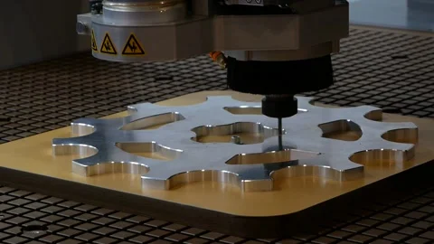 The CNC machine tool and milling machine produce a gear. Stock Footage 190447771