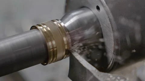 Cnc machine at work. cutting tool processing steel metal detail on turning cnc Stock Footage 228065594