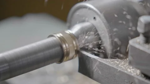 Cnc machine at work. cutting tool processing steel metal detail on turning cnc Stock Footage 231052226