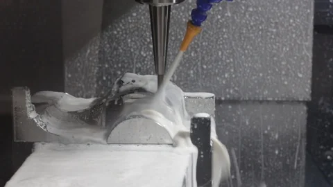 CNC machining center cutting workpiece ; Stock Footage 97389262