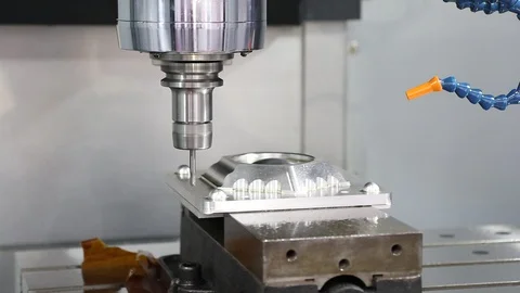 CNC machining center cutting workpiece ; Stock Footage 97390109