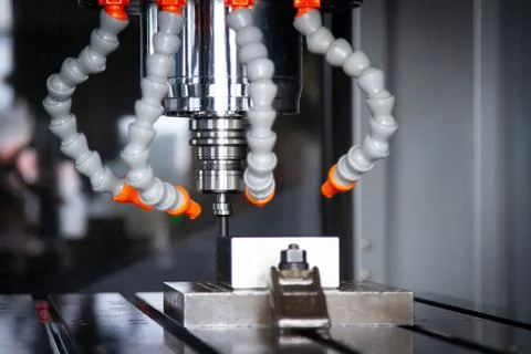 CNC machining center setting center bar after cutting metal Stock Photos