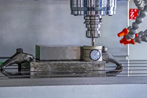 CNC machining with machine tool setting on box set before Stock Photos