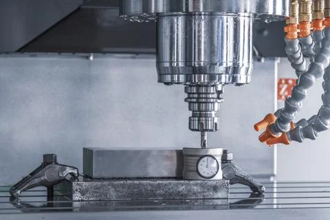 CNC machining tool setting center bar after cutting metal milling manufacturi Stock Photos