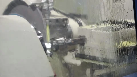 CNC machining view from behind the glass fence Stock Footage 313483477