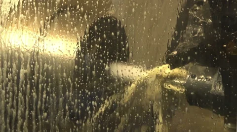 CNC. Manufacturing of metal elements. Metal industry. Liquid sprayed. Close up. Stock Footage 49028986