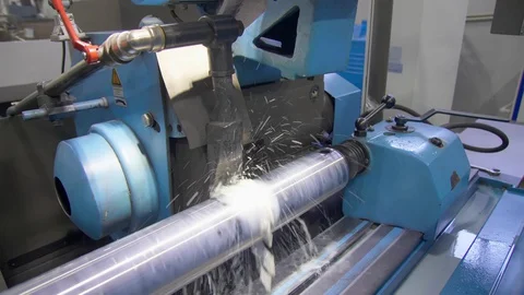 CNC metal grinding machine. Make the steel part smooth to shine. slide Stock-Footage 128821020