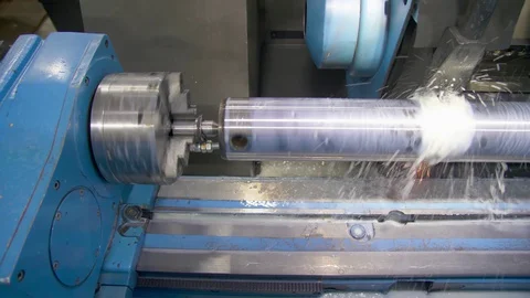 CNC metal grinding machine. Make the steel part smooth to shine. Sparks during Stock Footage 128821708
