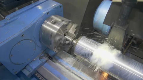 CNC metal grinding machine. Make the steel part smooth to shine. Sparks during Video stock 129100774
