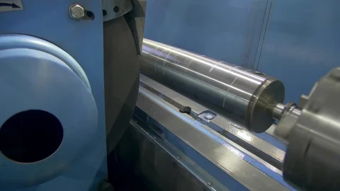 CNC metal grinding machine. Make the steel part smooth to shine. Sparks during Video stock 129101839