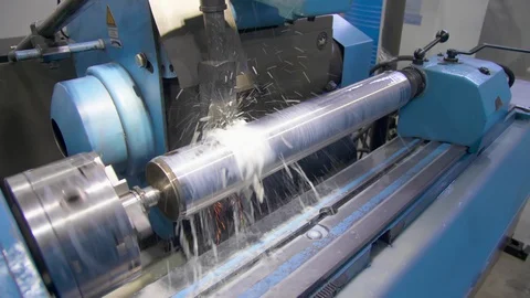 CNC metal grinding machine. Make the steel part smooth to shine. Sparks during Video stock 129846453