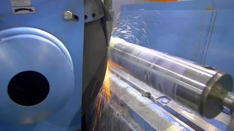 CNC metal grinding machine. Make the steel part smooth to shine. Sparks during Video stock 129847075