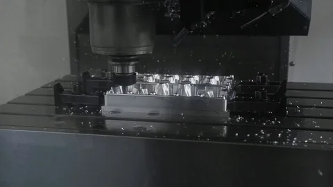 Cnc metal working machine with cutter tool luminium detail milling at factory Stock Footage 98543773