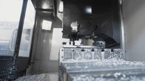 Cnc metal working machine with cutter tool luminium detail milling at factory Stock Footage 98544007