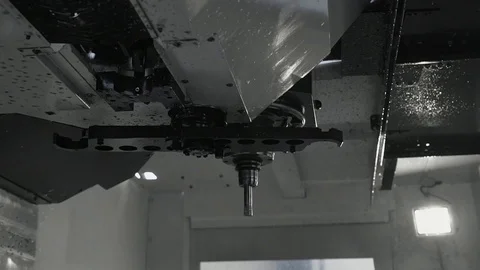 Cnc metal working machine with cutter tool luminium detail milling at factory Stock Footage 98544026