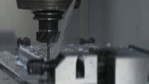 Cnc metal working machine with cutter tool luminium detail milling at factory Stock Footage 100021728
