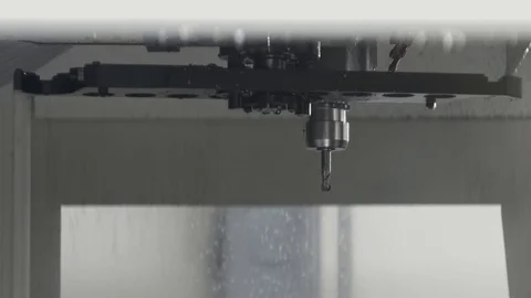 Cnc metal working machine with cutter tool luminium detail milling at factory Stock Footage 100022000